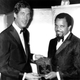 Berry Gordy Jr. receives the NAACP Award of the Year from commentator Barry Gray at the New York Hilton Hotel in 1968